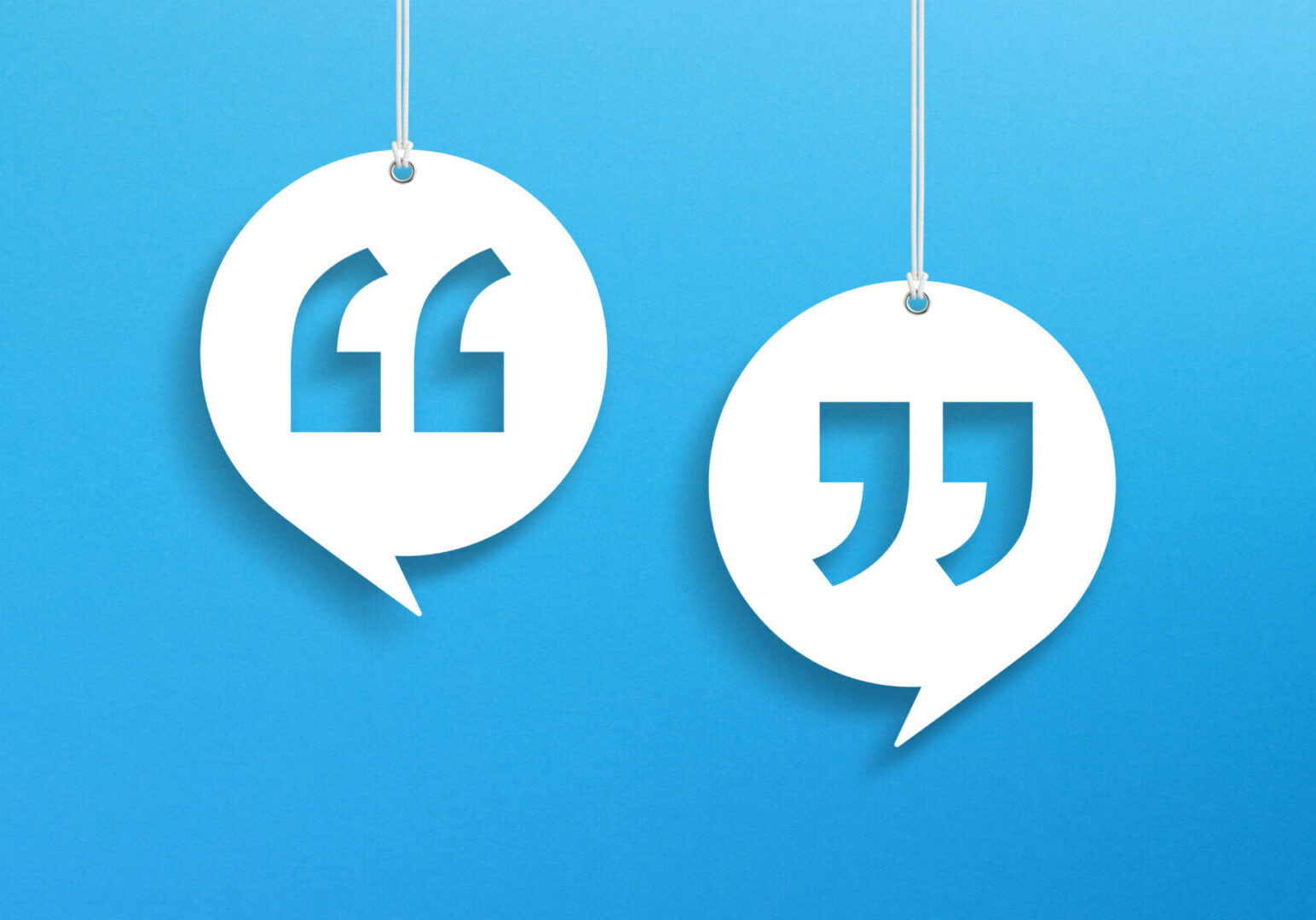 Speech Bubbles with Quotation Mark hanging on blue background